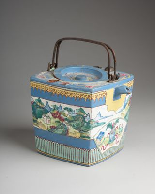 a blue and white box with a handle on it