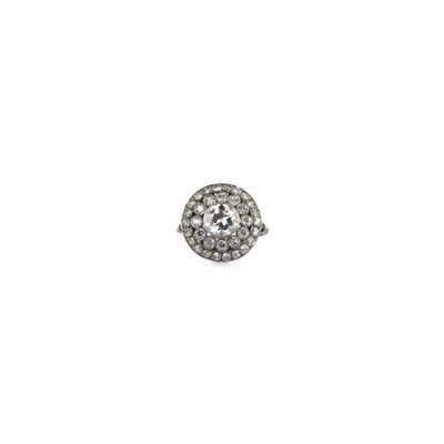 a close up of a diamond ring on a white background