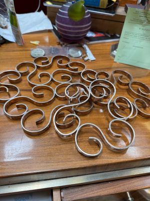 a table with a bunch of rings on top of it