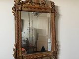 a mirror hanging on the wall in a room