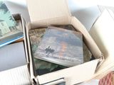 a box full of books sitting on top of a table