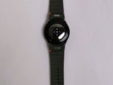 a close up of a smart watch on a white surface