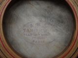 a close up of a wooden barrel with a label on it