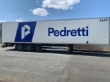 a semi truck that is parked on the side of the road