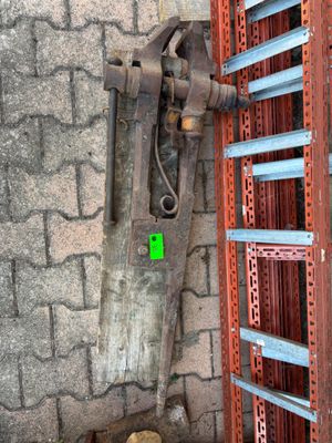 a large metal pipe attached to the side of a building
