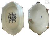 pair of antique blue and white porcelain dishes with a black and white design