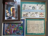 many pictures hanging on the wall of a room