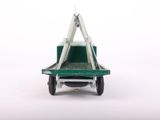 a toy truck that is sitting on a white surface