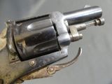 a gun that is sitting on top of a table