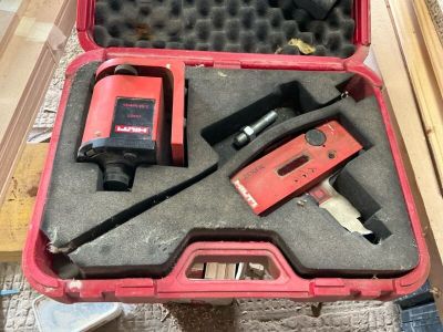 a tool in a case that is sitting on the floor
