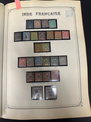 an open book with a picture of a number of stamps on it