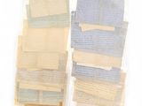 several pieces of paper are stacked on top of each other