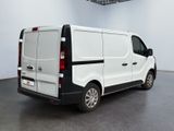 a white van that is parked in a room