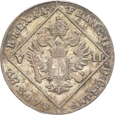 gros plan d'une pièce de monnaie sur fond blanc