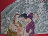 une vieille affiche de cinéma représentant deux femmes assises sur une plage