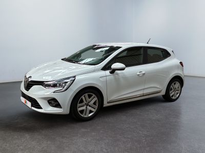 a white car is parked in a white room
