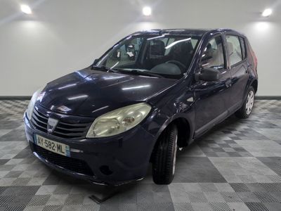 a picture of a small blue car parked in a garage