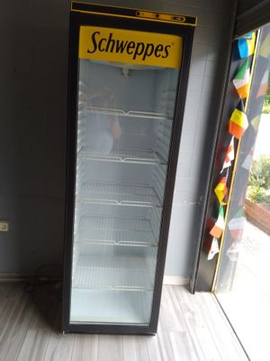 an image of a schweppes refrigerator in a store