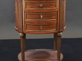 a small wooden table with two drawers and a shelf on top