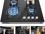 four different pictures of a stove top with a pot on it