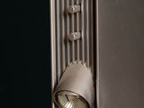 a clock that is on the side of a door