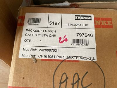 a box with a sticker on it sitting on a table