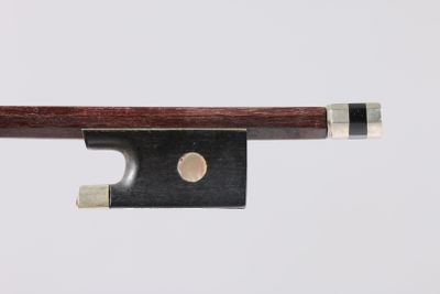 a close up of a violin bow on a white background
