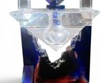 a glass perfume bottle with a blue and purple design on it