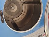 an image of a washing machine with the door open