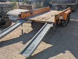 une image représentant une remorque à plateau avec un plateau plat