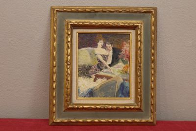 tableau représentant une femme assise sur un canapé, dans un cadre doré