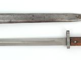two different types of knives on a white surface