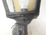 a light that is on the side of a building