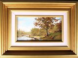 an oil painting of a river scene with trees and a bridge