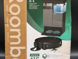 the box is open to show the contents of a water dispenser