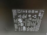 a close up of the back of a laptop computer with a battery