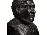 the bust of a man with a mustache is shown on a white background