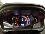 the dashboard of a car with a digital display on it
