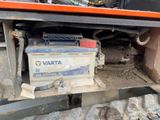 a car battery that is in the back of a truck