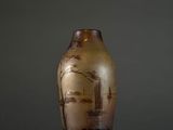 a vase that has a picture of a boat on it