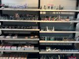 a large display of makeup products in a store