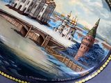 a plate with a picture of a church on it