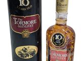 an image of a bottle of turmmore and a canister of whisky