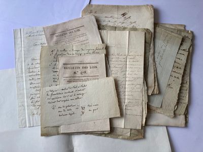 several old papers are stacked on top of each other