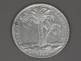 an image of a silver coin with a palm tree on it