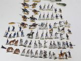 a lot of figurines that are on a table