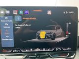 a picture of a car ' s dashboard with a digital display on it
