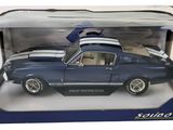 toy car in a box on a white background with a blue and white stripe