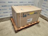 an image of a cardboard box sitting on a pallet in front of a wall