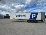 a semi truck that is parked in a parking lot
